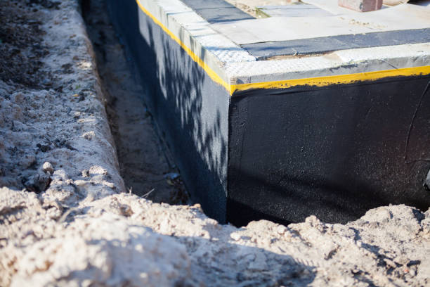 Professional Waterproofing technician working in Custer, MI